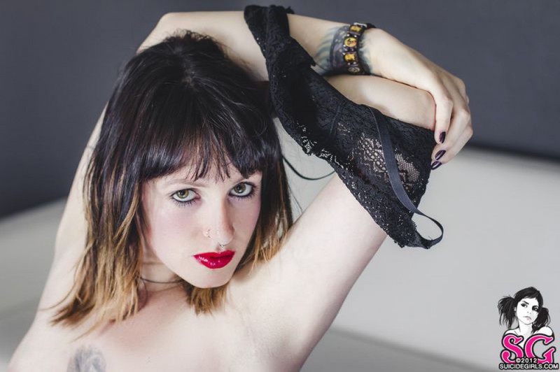 Стильная неформалка демонстрирует татуировки 12 фото Стильная неформалка демонстрирует татуировки 12 фото