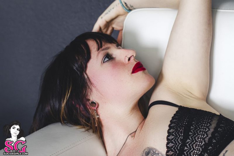 Стильная неформалка демонстрирует татуировки 18 фото Стильная неформалка демонстрирует татуировки 18 фото